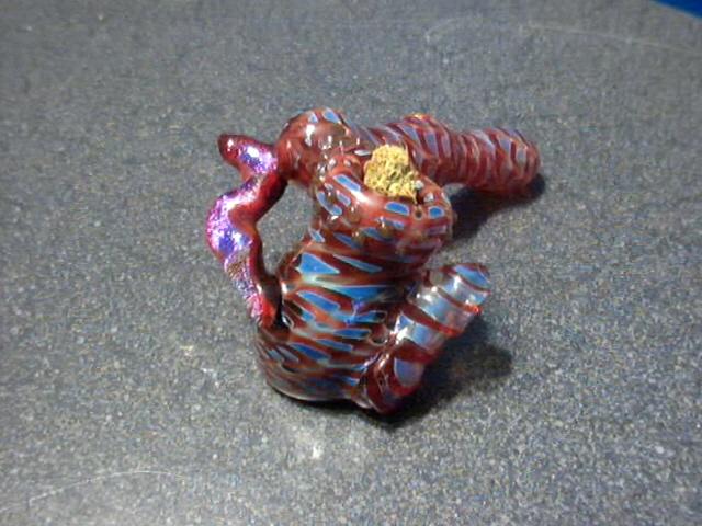 This is another piece I got from my B-day, made by Tracy.  Different Blower than before.  I love the Dicro ribbon and how the carb has it's own tube.  It attaches at the bottom so when u clear the pipe u really clears it. I only smoke nugs in this bowl. No shwag allowed!