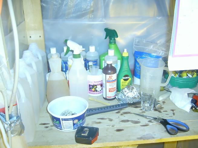 As you can see we got our water lined up on the left, and we usually leave it out for 3 days before putting it in our soil. We only use organice ferts and its called DNF. we use it every other watering, only because the NPK is so low. We jsut got our blooming fert, and its at a 0-50-30. Were going to use it once a week.